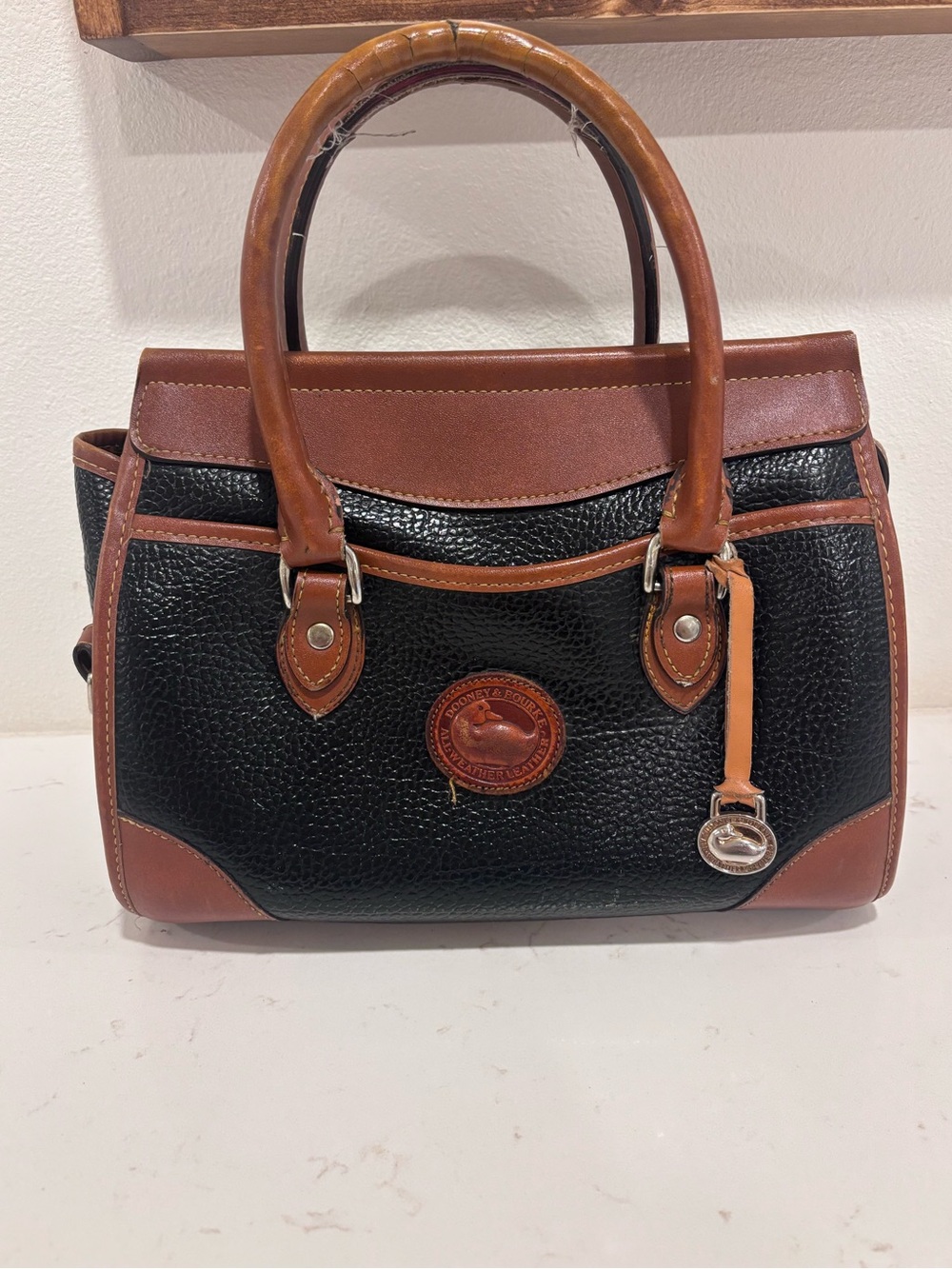 Vintage Dooney & Bourke Black and Brown Leather purse read description